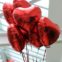 Globos rojos en forma de corazón