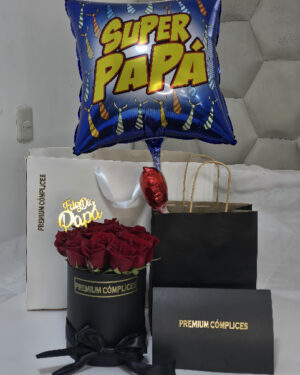 BOX PREMIUM CÓMPLICES CON 12 ROSAS ROJAS